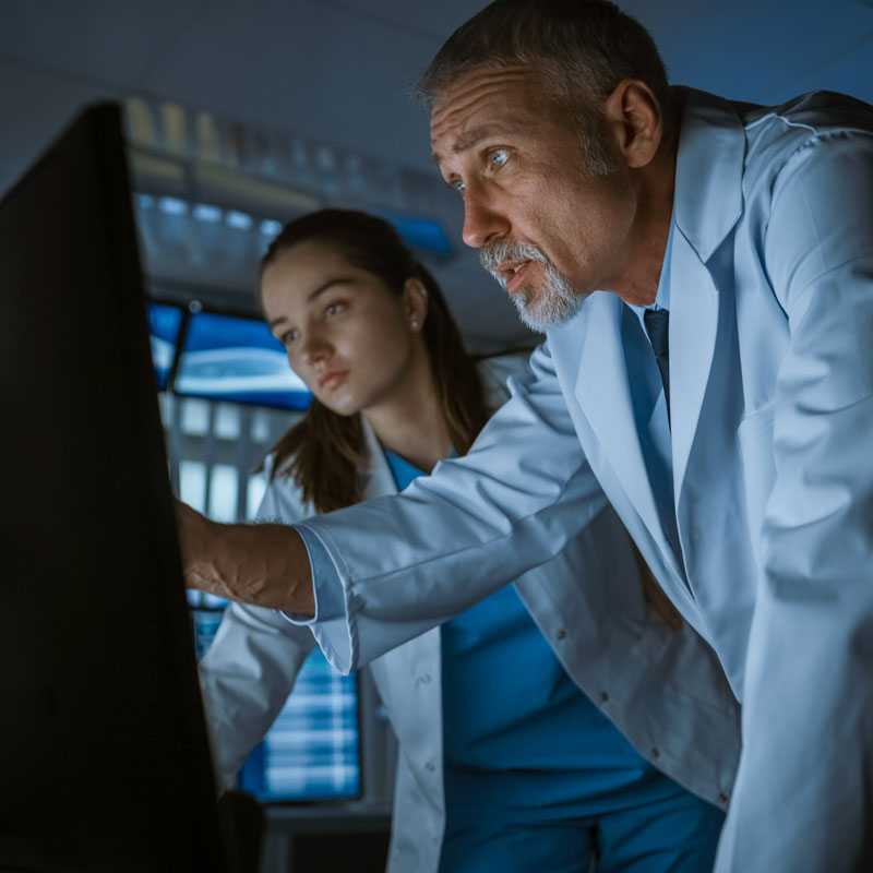 two doctors looking over lab results