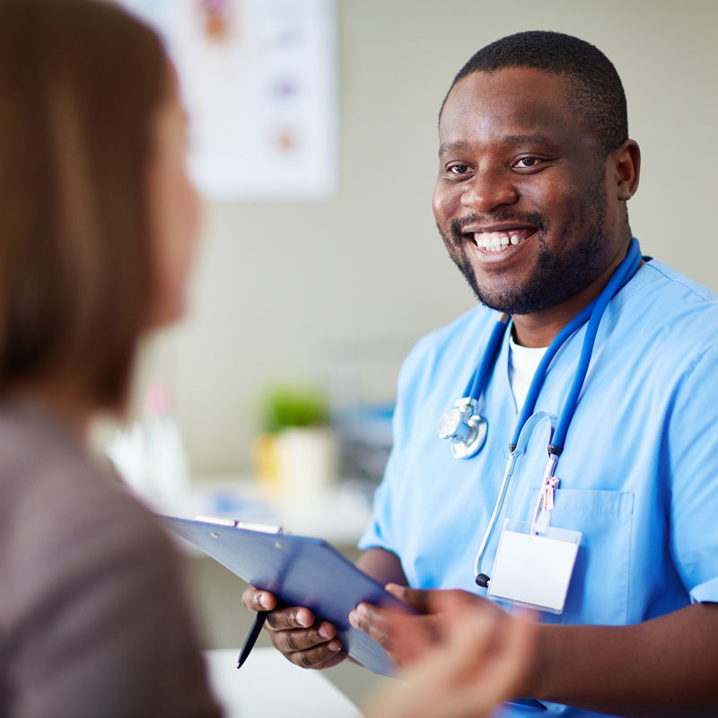 nurse smiling at patient